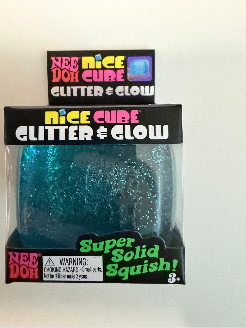 NeeDoh Nice Cube Glitter & Glow Super Solid Squish - Teal Sparkle
